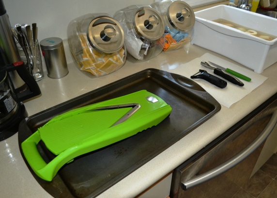 Tools of the trade . . . mandoline, peeler, corer and paring knife . . .